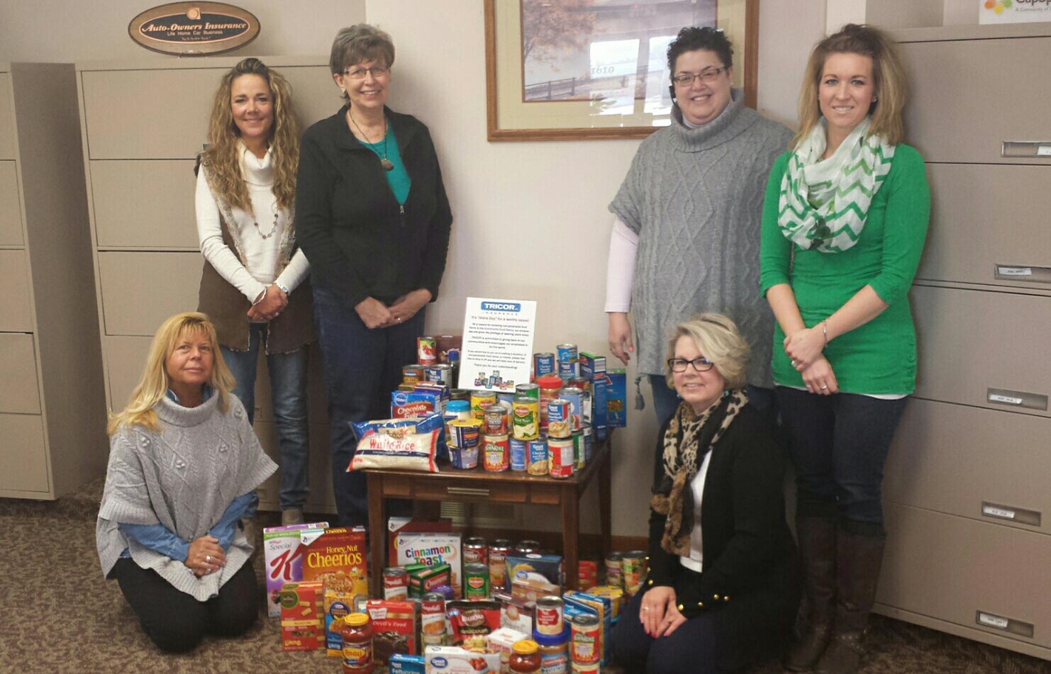 TRICOR employees surround donation to SWEPS of Wisconsin Rapids Food Pantry